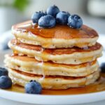 Cottage Cheese Pancakes with Berries and Syrup